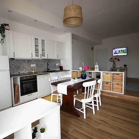 Casa Vacanze * פורטוסקוזו